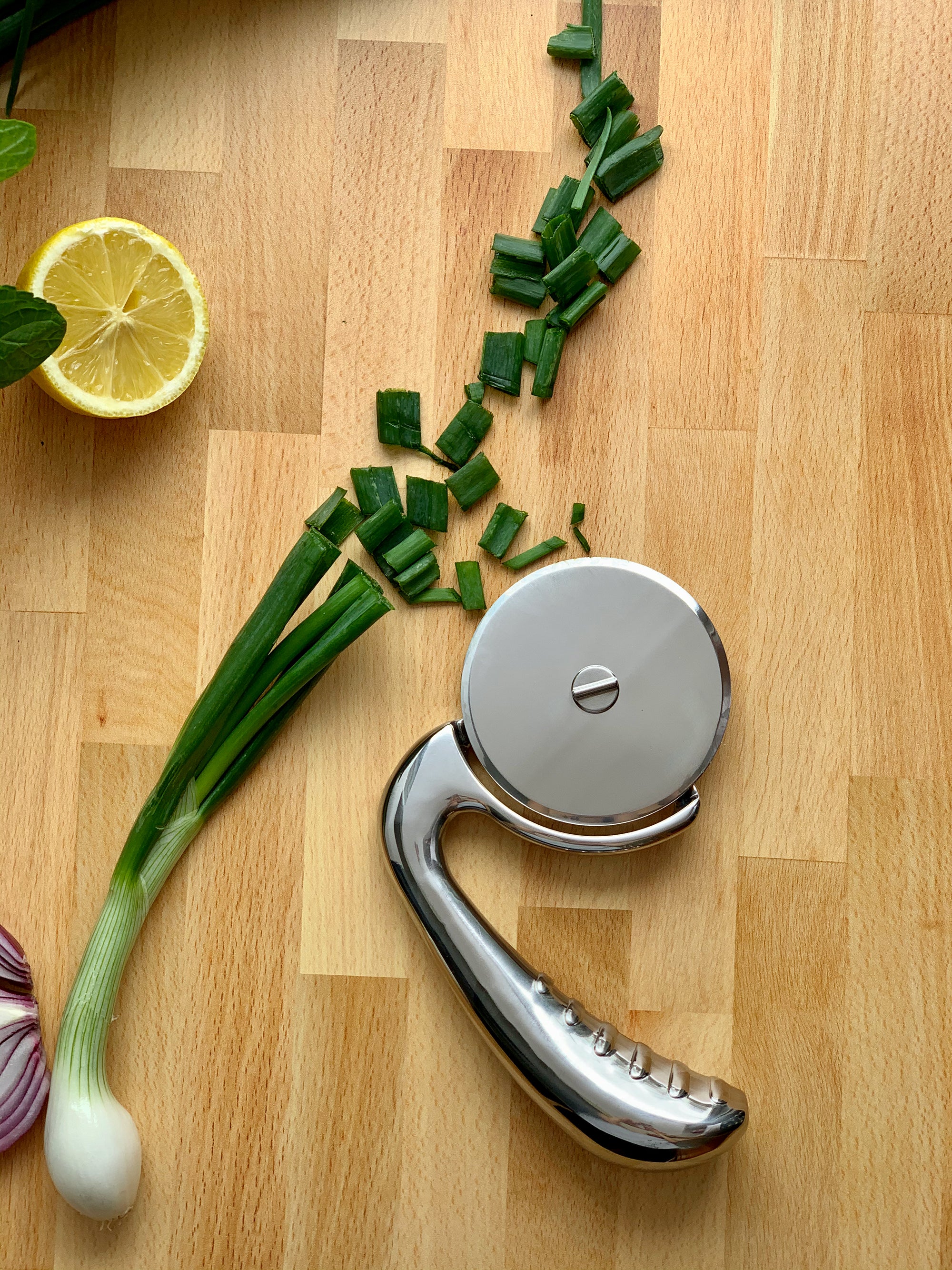 Versatile Kitchen Gadget for Pizza and Other Foods Made of Durable Stainless Steel: Your Go-To Slicing Tool